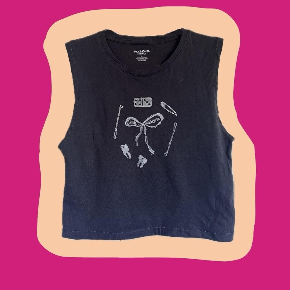 ✨One-of-a-kind✨ stamped with fabric paint on a thrifted and reworked t-shirt.